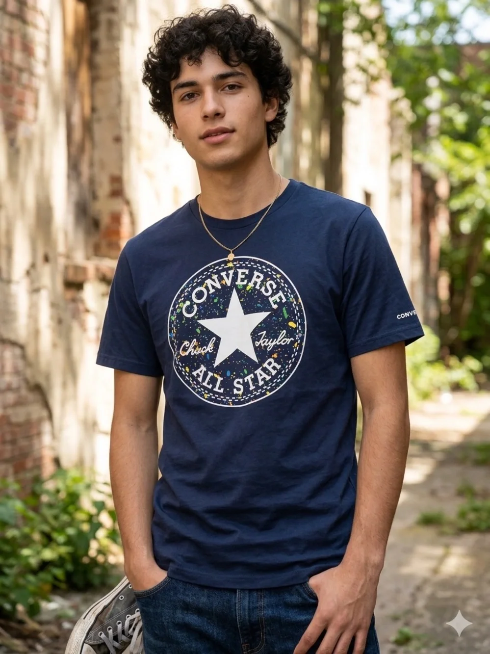 Converse navy tee shirt with white and multi colored logo kids size large